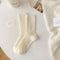 Aude | Wollsocken mit Zopfmuster